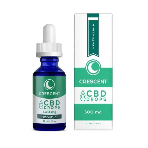 a blue tincture with green and white packaging, writes crescent canna CBD drops, 500mg, peppermint flavor